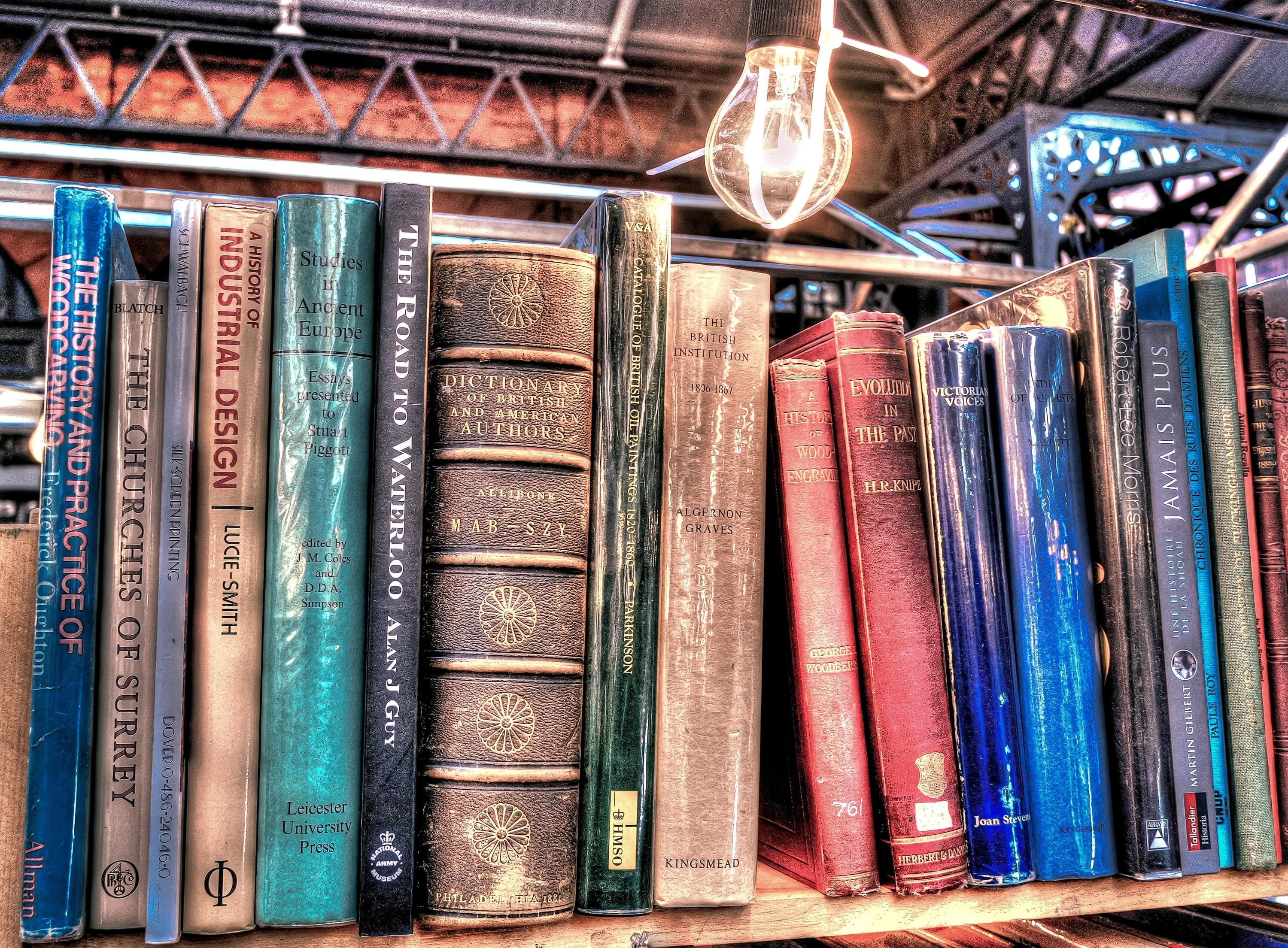 aged-antique-book-stack-459694